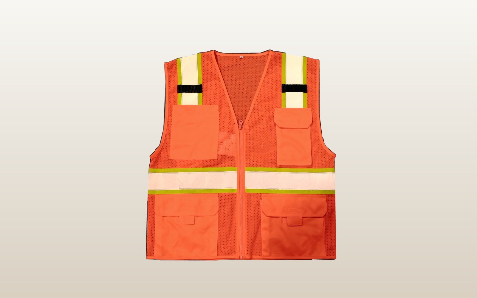 Class 2 mesh surveyor vest in daylight: fluorescent orange mesh with cream retro-reflective bands edged in lime across the shoulders and waist